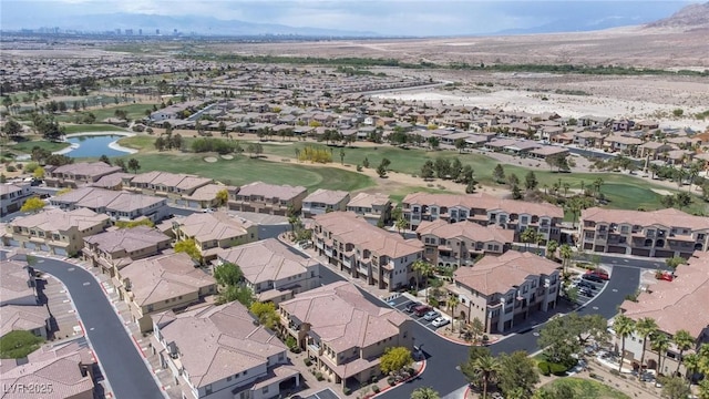 1040 Via Panfilo Ave, Henderson, NV 89011 - aerial view of property and surrounding area featuring a golf course, a water and mountain view, and nearby suburban area
