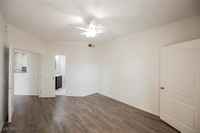 7400 W Flamingo Rd Unit 1082, Las Vegas, NV 89147 - empty room with a ceiling fan and dark wood-type flooring