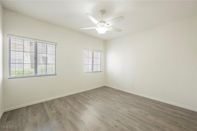 7400 W Flamingo Rd Unit 1082, Las Vegas, NV 89147 - spare room with plenty of natural light, wood finished floors, and ceiling fan