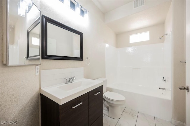 7400 W Flamingo Rd Unit 1082, Las Vegas, NV 89147 - full bath with vanity, shower / bathtub combination, decorative backsplash, and marble look tile flooring
