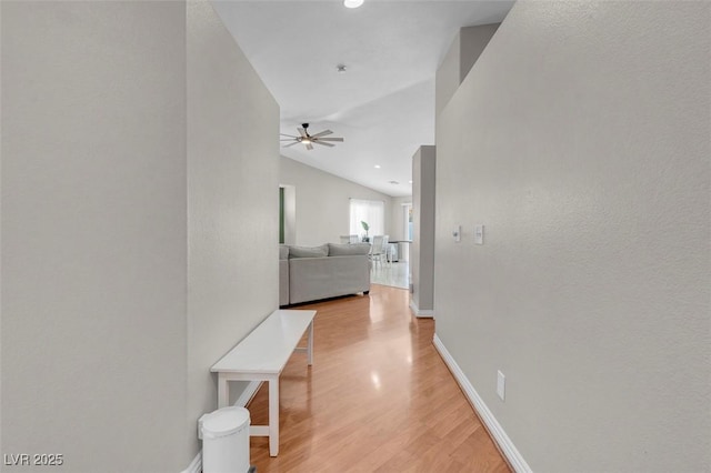 509 Regal Robin Way N, Las Vegas, NV 89084 - hall featuring light wood-style floors, lofted ceiling, baseboards, and recessed lighting