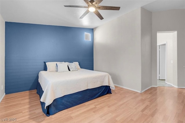 509 Regal Robin Way N, Las Vegas, NV 89084 - bedroom with wood finished floors, baseboards, and a ceiling fan