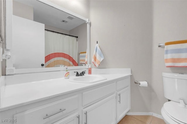 509 Regal Robin Way N, Las Vegas, NV 89084 - full bath with toilet, vanity, tile patterned flooring, and baseboards