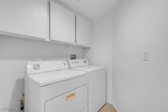 509 Regal Robin Way N, Las Vegas, NV 89084 - washroom featuring separate washer and dryer, cabinet space, light tile patterned floors, and baseboards