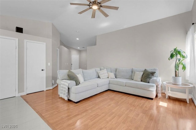 509 Regal Robin Way N, Las Vegas, NV 89084 - living area featuring ceiling fan, lofted ceiling, baseboards, light wood-style flooring, and recessed lighting