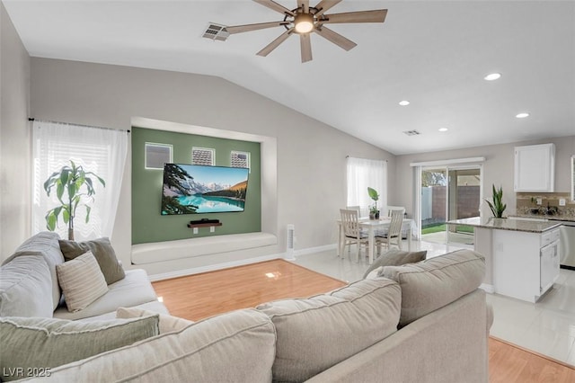 509 Regal Robin Way N, Las Vegas, NV 89084 - living area featuring lofted ceiling, light wood-style floors, a ceiling fan, recessed lighting, and baseboards