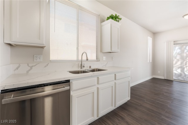 6140 Passionate Ct, North Las Vegas, NV 89031 - kitchen with dishwasher, a sink, white cabinets, dark wood-style flooring, and baseboards