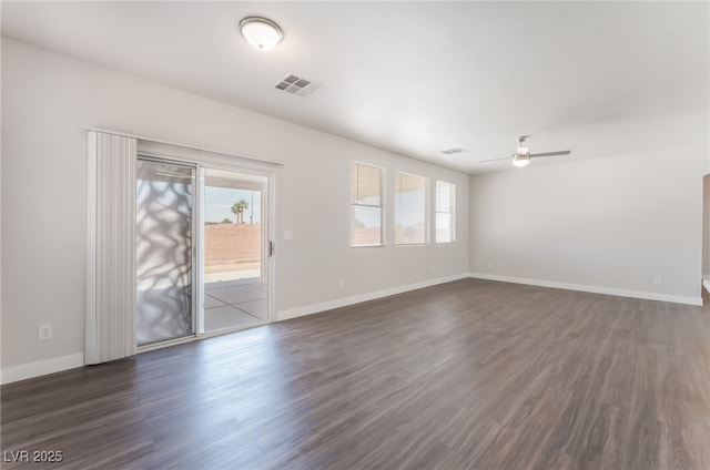 6140 Passionate Ct, North Las Vegas, NV 89031 - unfurnished room with plenty of natural light, a ceiling fan, dark wood-style floors, and baseboards