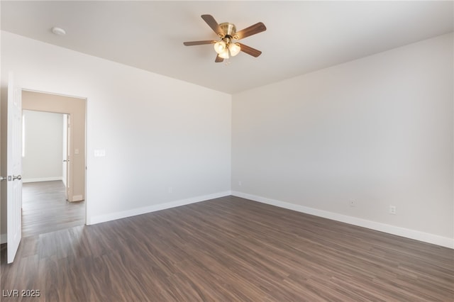 6140 Passionate Ct, North Las Vegas, NV 89031 - spare room with ceiling fan, baseboards, and dark wood-type flooring