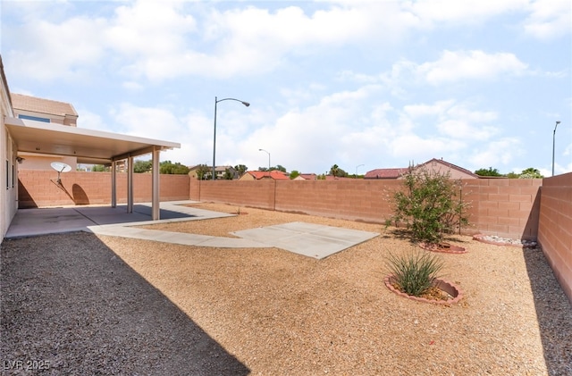 6140 Passionate Ct, North Las Vegas, NV 89031 - fenced backyard featuring a patio area
