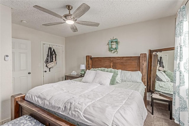 3417 Lillis Cir, North Las Vegas, NV 89030 - carpeted bedroom featuring a closet, a ceiling fan, and a textured ceiling