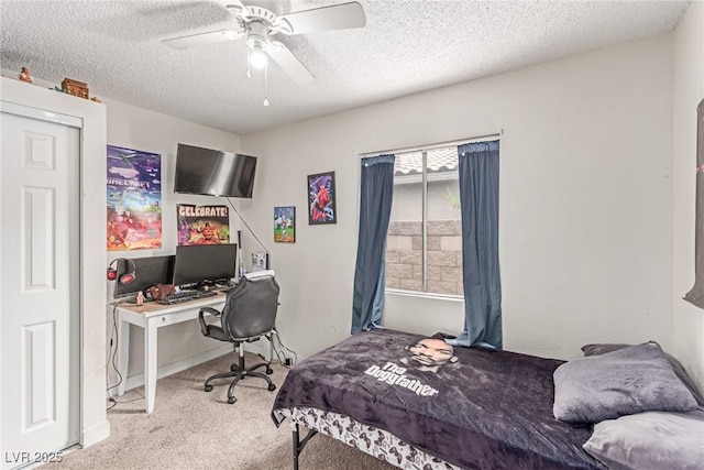 3417 Lillis Cir, North Las Vegas, NV 89030 - carpeted bedroom featuring a textured ceiling, a desk, and ceiling fan