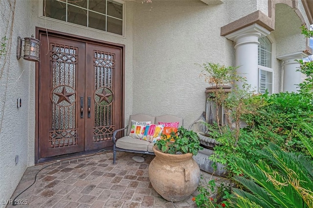4326 Spooner Lake Cir, Las Vegas, NV 89147 - doorway to property with stucco siding and french doors