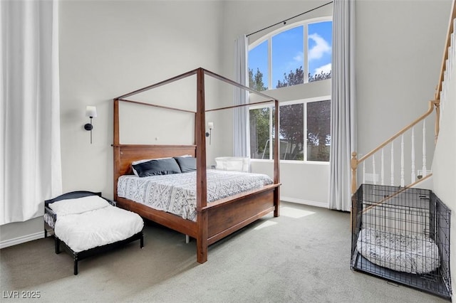 4326 Spooner Lake Cir, Las Vegas, NV 89147 - bedroom featuring a high ceiling, carpet, and baseboards