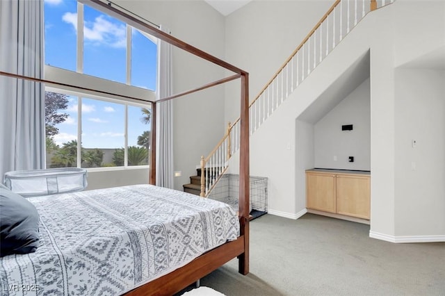 4326 Spooner Lake Cir, Las Vegas, NV 89147 - bedroom featuring carpet flooring, a high ceiling, and baseboards