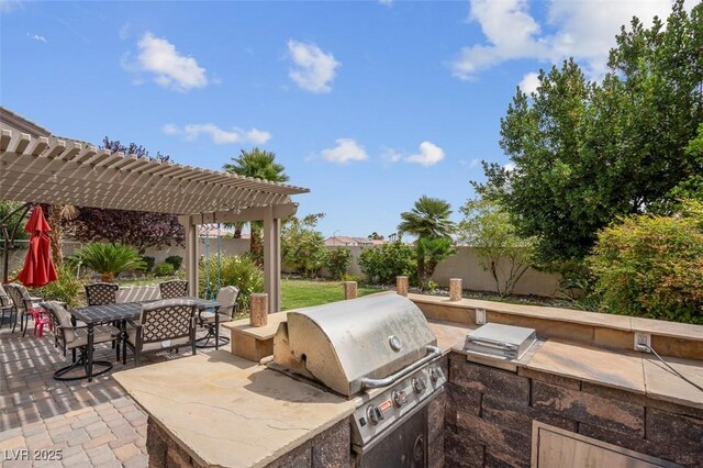 4326 Spooner Lake Cir, Las Vegas, NV 89147 - fenced backyard featuring a pergola, outdoor dining space, and a patio area