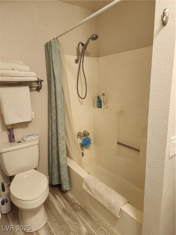 4805 S Torrey Pines Dr Unit 101, Las Vegas, NV 89103 - full bath featuring wood finished floors, toilet, and shower / bath combo