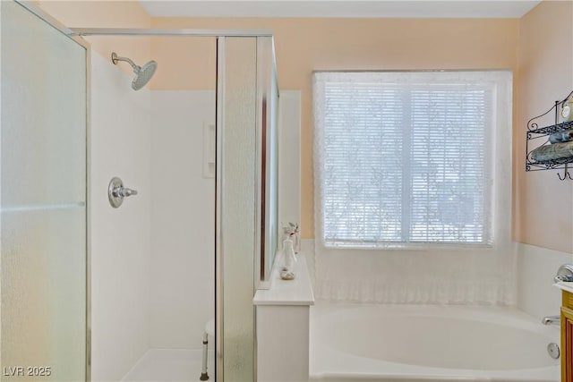 967 Cardelina Ln, Henderson, NV 89052 - bathroom featuring a shower stall and a bath