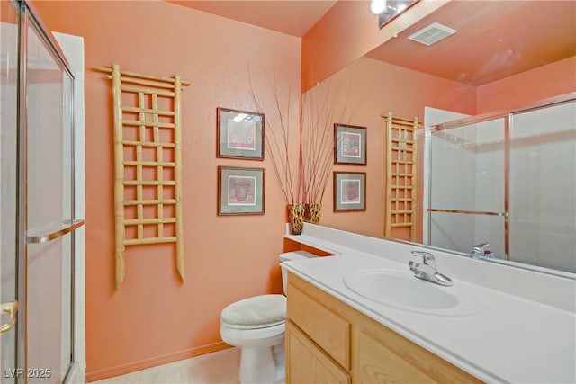 967 Cardelina Ln, Henderson, NV 89052 - bathroom with toilet, a shower stall, and vanity