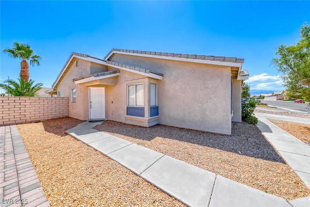 2103 Falcon Crest Ave, North Las Vegas, NV 89031 - view of front facade with stucco siding