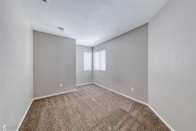 2103 Falcon Crest Ave, North Las Vegas, NV 89031 - carpeted spare room featuring baseboards