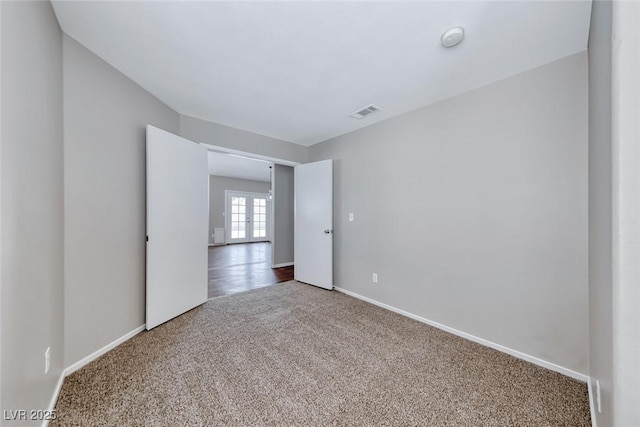 2103 Falcon Crest Ave, North Las Vegas, NV 89031 - carpeted empty room featuring baseboards and a smoke detector