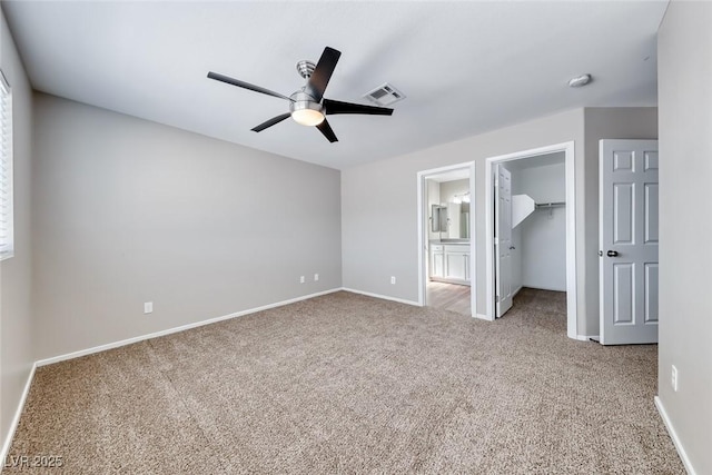 2103 Falcon Crest Ave, North Las Vegas, NV 89031 - unfurnished bedroom featuring carpet flooring, a spacious closet, baseboards, and a closet
