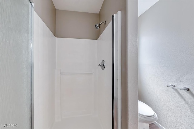 2103 Falcon Crest Ave, North Las Vegas, NV 89031 - bathroom featuring a shower stall and toilet