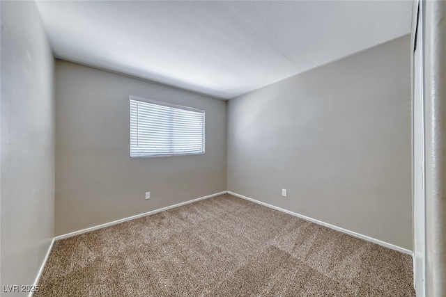 2103 Falcon Crest Ave, North Las Vegas, NV 89031 - spare room featuring carpet floors and baseboards