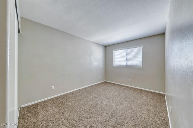 2103 Falcon Crest Ave, North Las Vegas, NV 89031 - empty room with carpet floors and baseboards