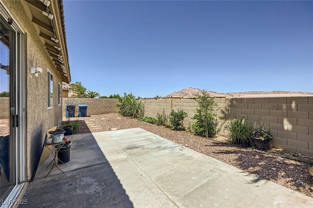 3642 Winter Whitetail St, Las Vegas, NV 89122 - fenced backyard with a patio area