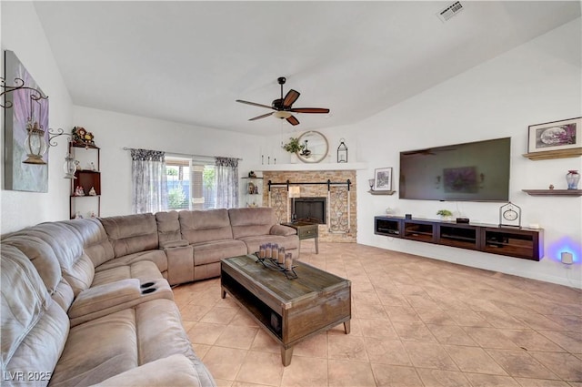 5725 N Durango Dr, Las Vegas, NV 89149 - living room featuring ceiling fan, light tile patterned flooring, lofted ceiling, and a barn door