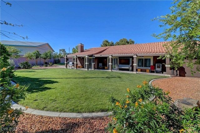 5725 N Durango Dr, Las Vegas, NV 89149 - back of house featuring a tiled roof, a chimney, a patio area, and stucco siding