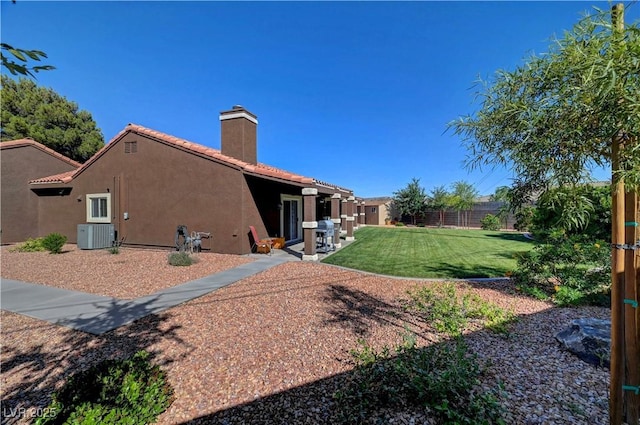 5725 N Durango Dr, Las Vegas, NV 89149 - view of yard with cooling unit and a patio
