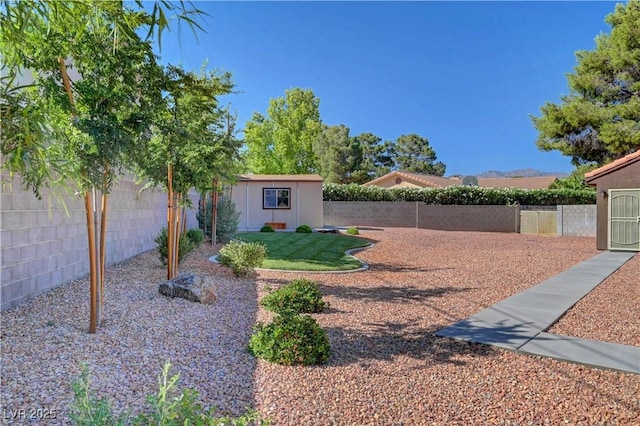 5725 N Durango Dr, Las Vegas, NV 89149 - fenced backyard with an outbuilding