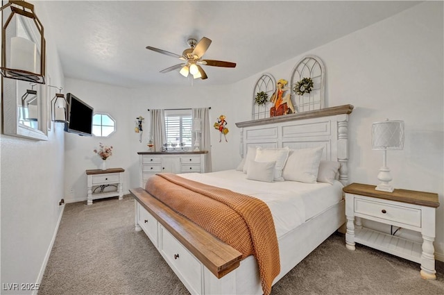 5725 N Durango Dr, Las Vegas, NV 89149 - bedroom featuring light colored carpet, baseboards, and ceiling fan