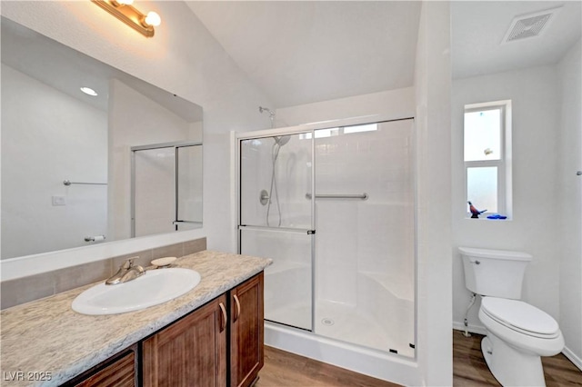 5725 N Durango Dr, Las Vegas, NV 89149 - full bath featuring wood finished floors, vanity, toilet, and a shower stall