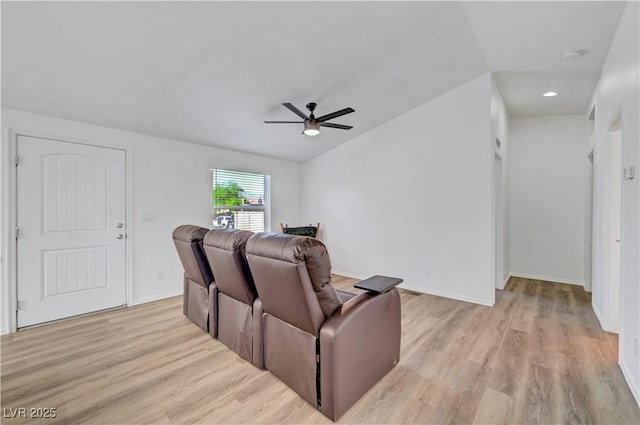 5725 N Durango Dr, Las Vegas, NV 89149 - home theater with a ceiling fan, light wood finished floors, vaulted ceiling, and baseboards