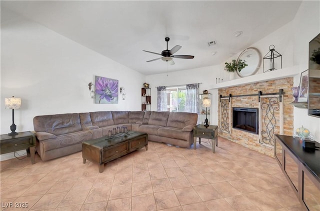 5725 N Durango Dr, Las Vegas, NV 89149 - living area with a ceiling fan, light tile patterned flooring, and a barn door