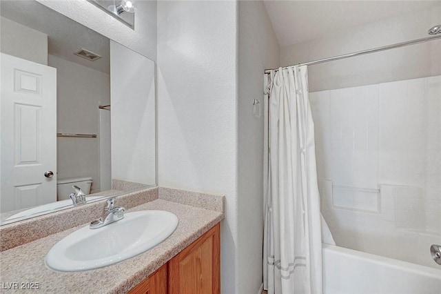 1574 Ward Frontier Ln, Henderson, NV 89002 - bathroom with vanity, shower / tub combo, and toilet