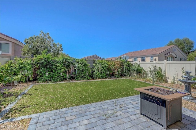 1574 Ward Frontier Ln, Henderson, NV 89002 - view of patio / terrace with an outdoor fire pit