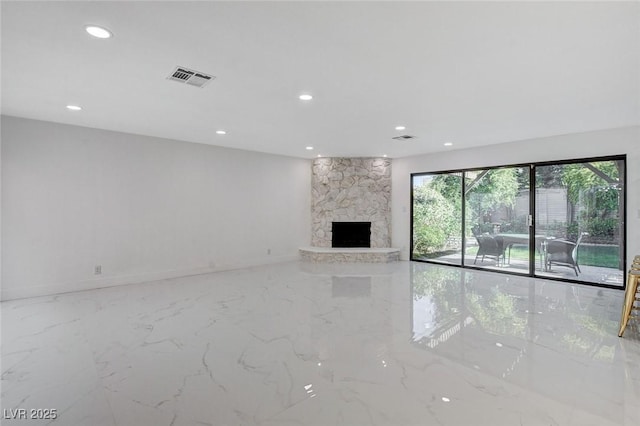 3013 Plaza De Rosa, Las Vegas, NV 89102 - unfurnished living room featuring recessed lighting, marble tiled floors, a fireplace, and baseboards