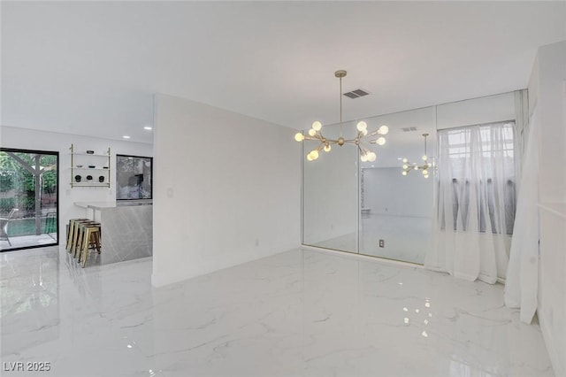 3013 Plaza De Rosa, Las Vegas, NV 89102 - empty room with a chandelier and marble tiled floors