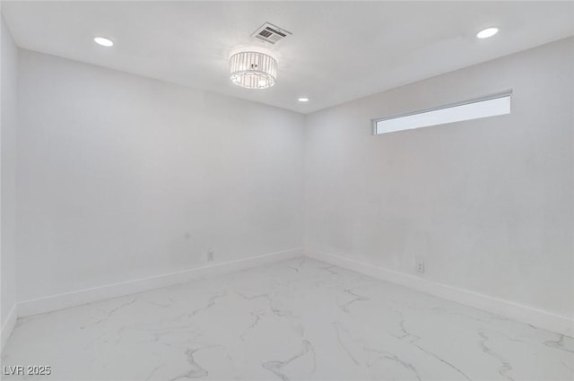 3013 Plaza De Rosa, Las Vegas, NV 89102 - spare room featuring light marble finish floors, baseboards, and recessed lighting