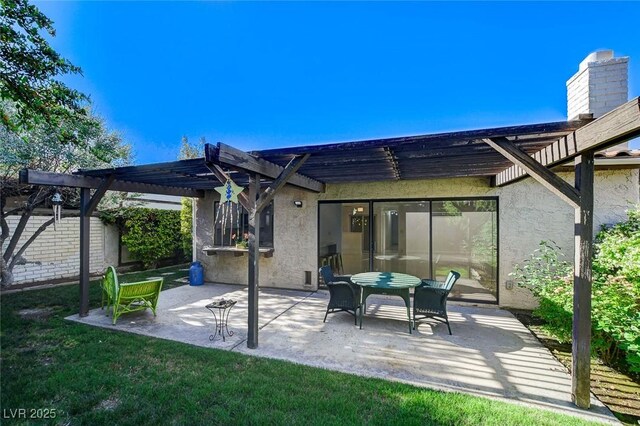 3013 Plaza De Rosa, Las Vegas, NV 89102 - back of house featuring a pergola, stucco siding, and a patio
