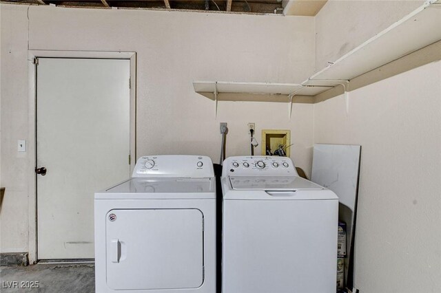 3013 Plaza De Rosa, Las Vegas, NV 89102 - laundry room with washer and dryer