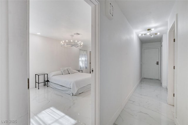 3013 Plaza De Rosa, Las Vegas, NV 89102 - hall with marble tiled floors, a chandelier, and baseboards