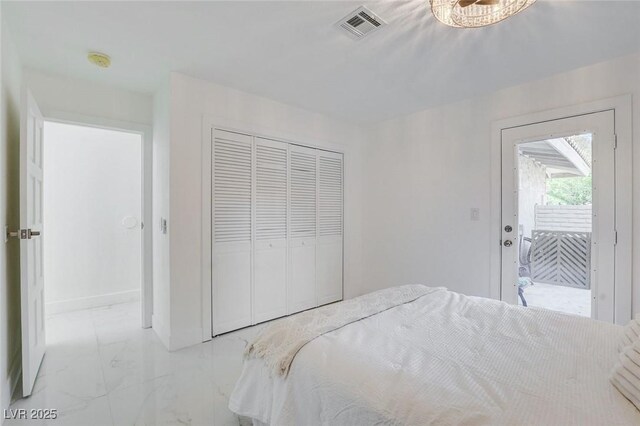 3013 Plaza De Rosa, Las Vegas, NV 89102 - bedroom featuring marble finish floors and a closet