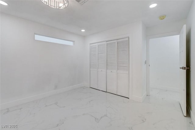 3013 Plaza De Rosa, Las Vegas, NV 89102 - unfurnished bedroom with marble finish floors, recessed lighting, baseboards, and a closet