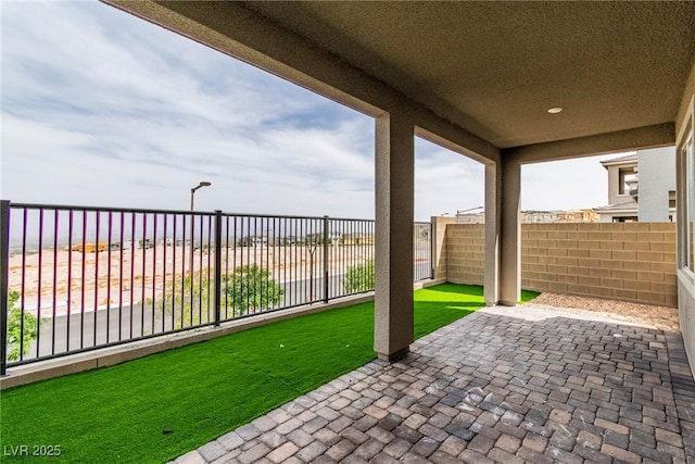 1596 Pacific Baza St, Las Vegas, NV 89138 - fenced backyard with a patio area
